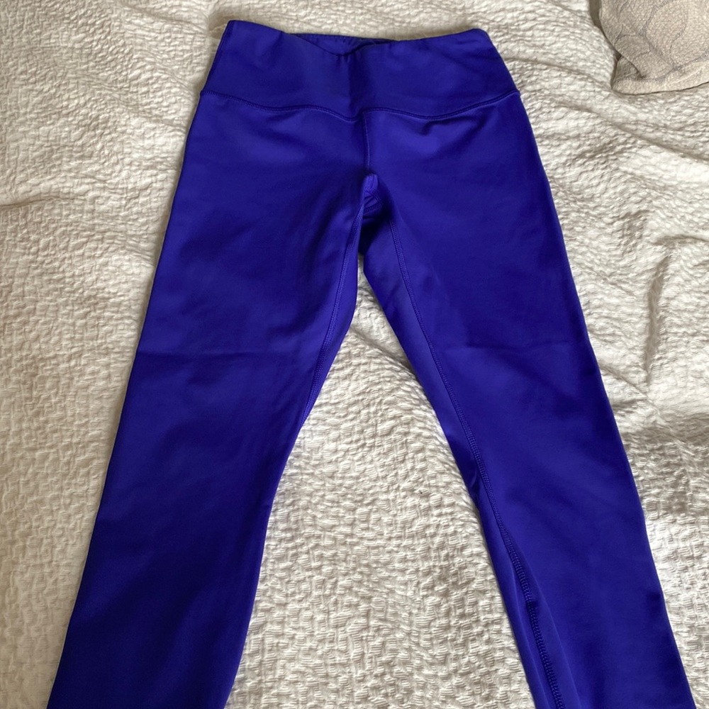 Women’s 7/8 yoga pants in bright blue/purple color